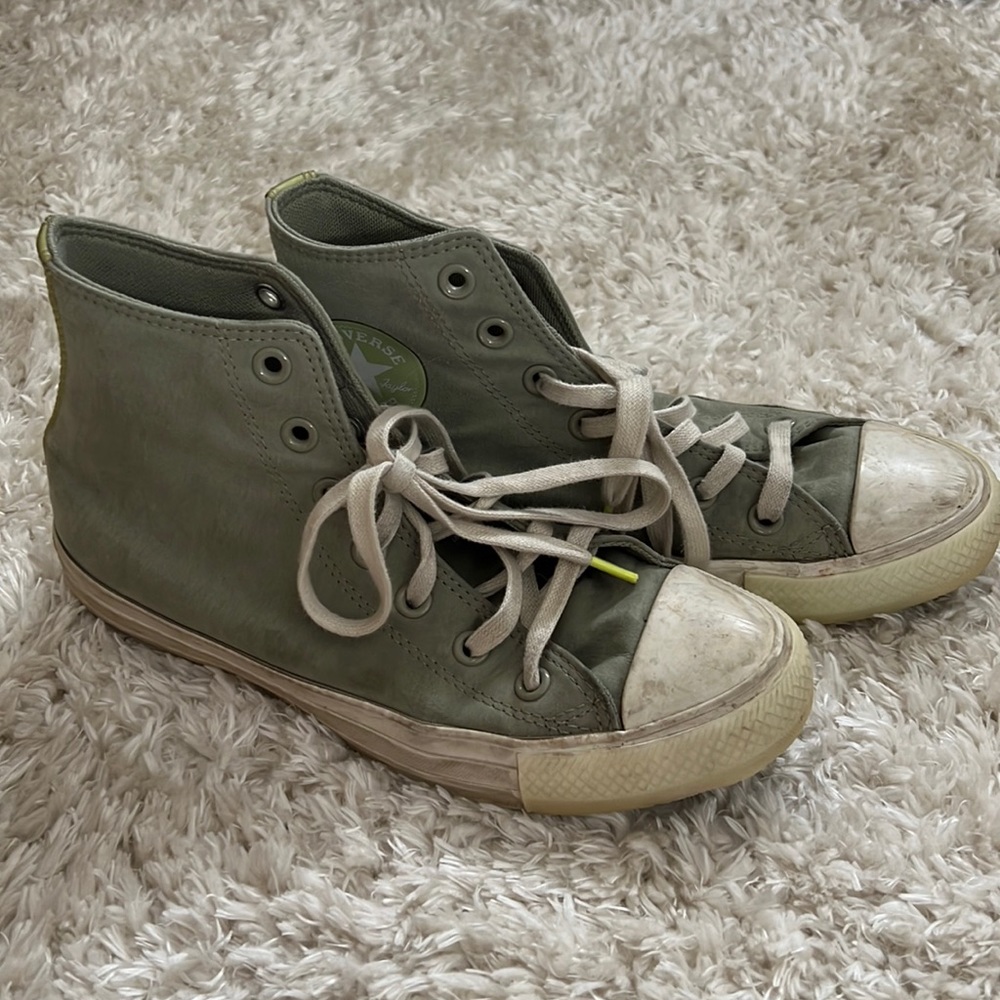 Green vintage style high top converse